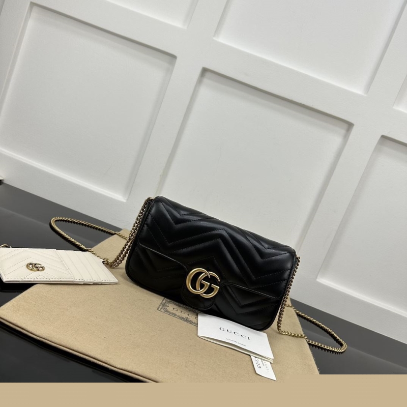 G*u*i satchel bags